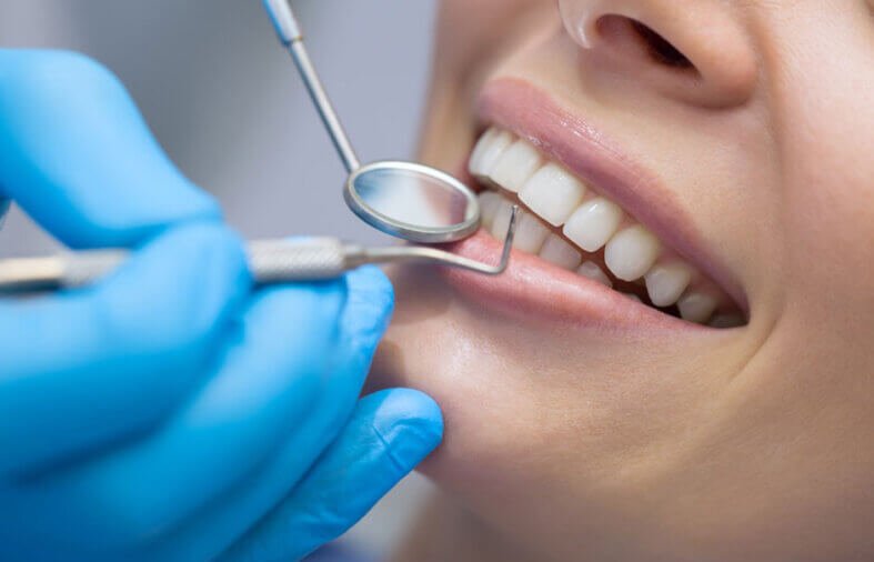 Difference between a dentist and an oral health therapist